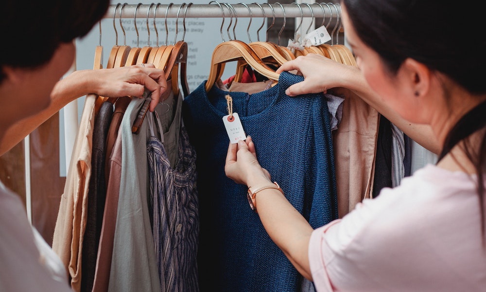 woman checking clothing price