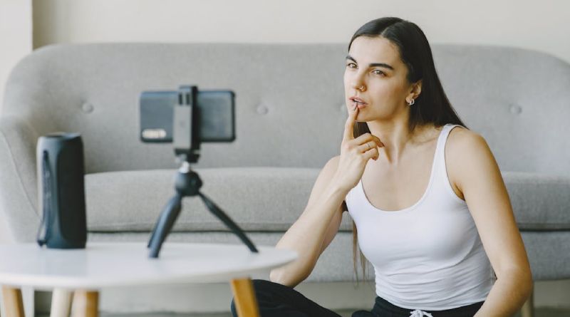 A female influencer preparing to record a video
